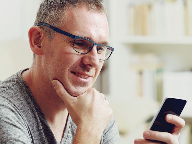 Man Looking at a Phone