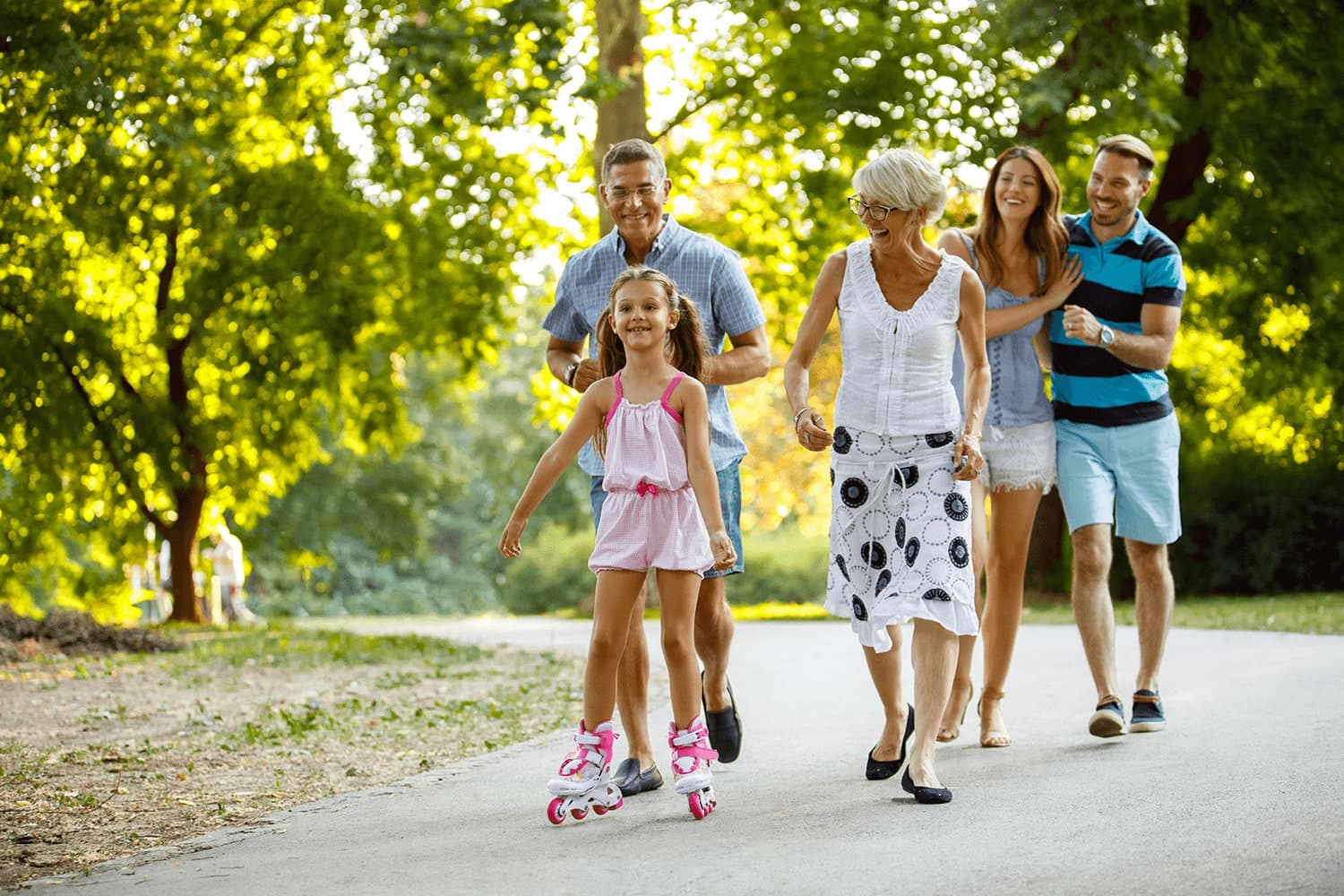Family walking together outdoors while talking
