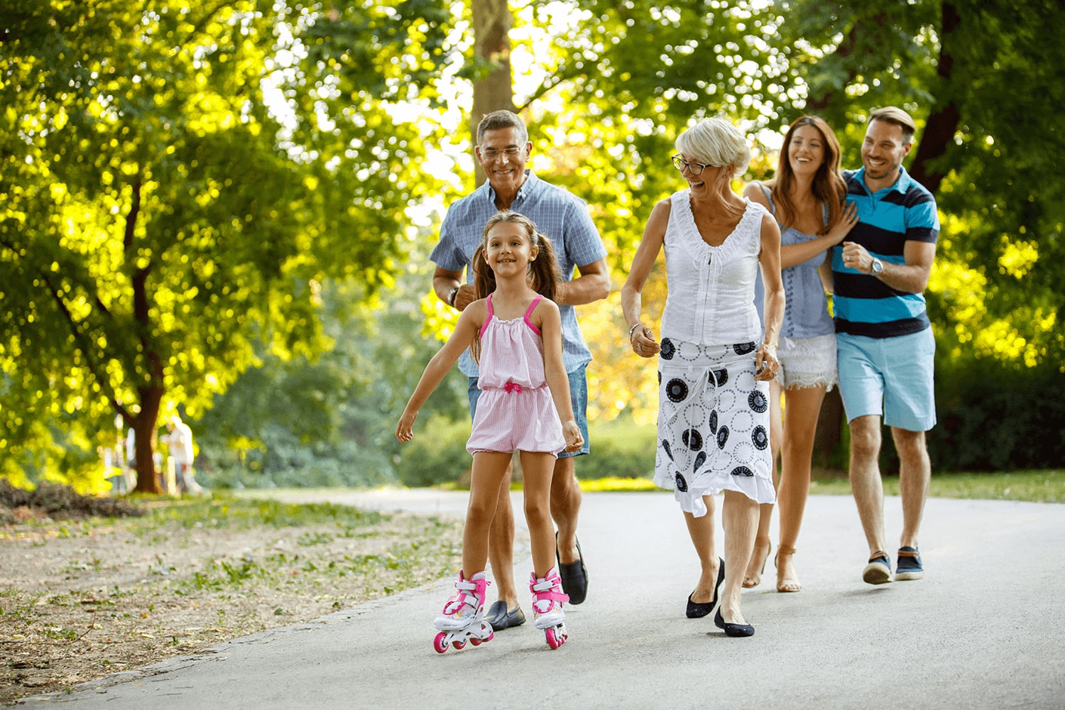 Family walking together outdoors while talking