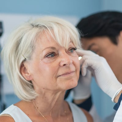 Patient receiving a hearing assessment