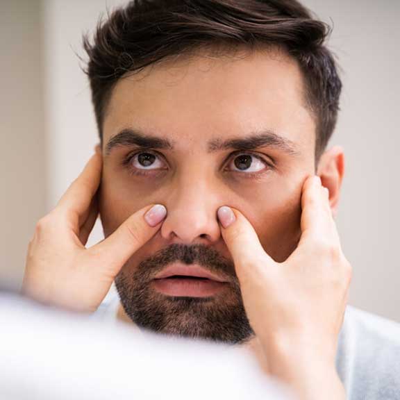 Physician Doctor Doing Sinusitis Examination For Sinus Inflammation